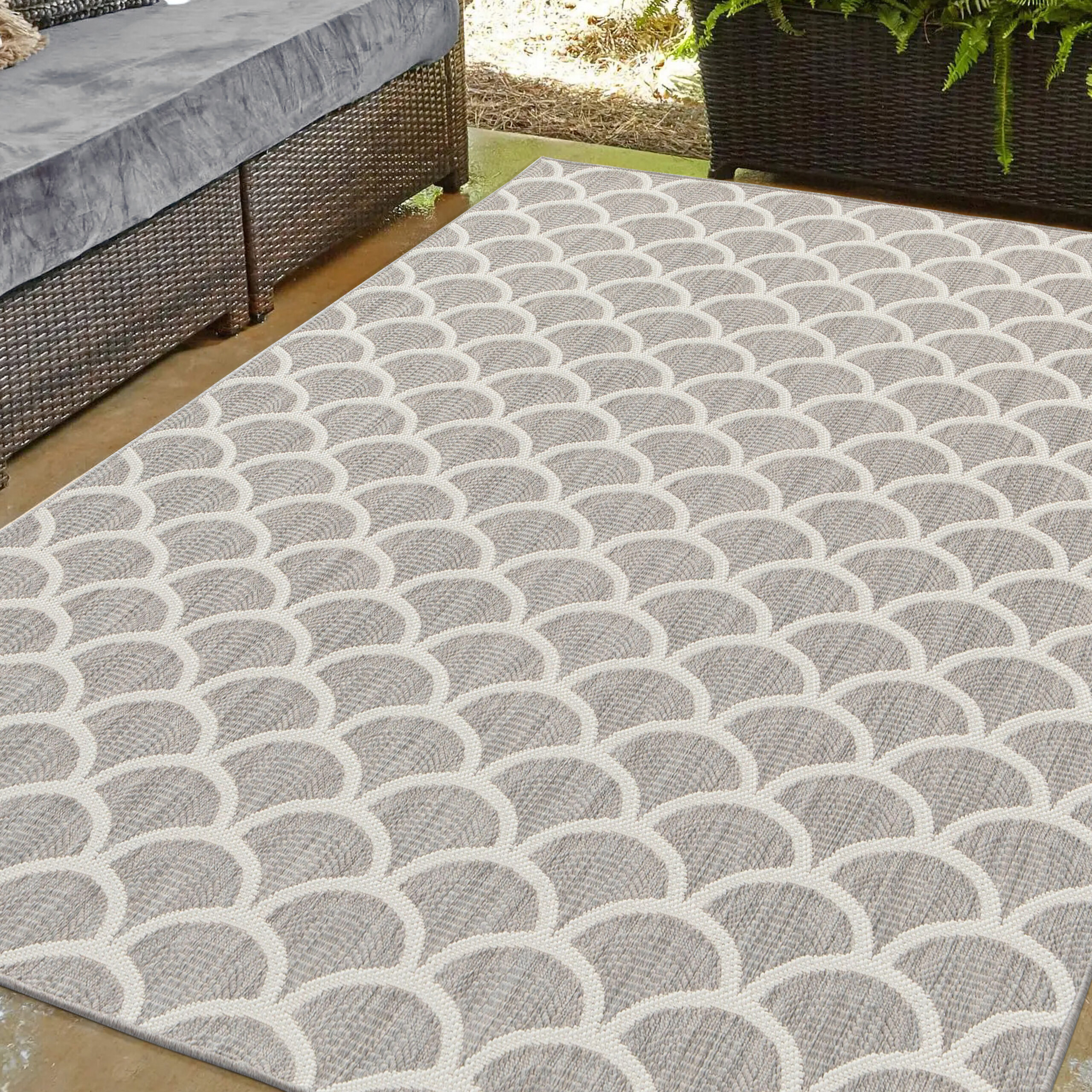 Modern geometric outdoor area botanical rug design.